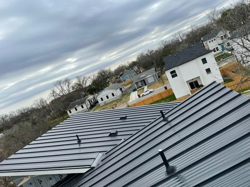 Standing seam metal roof panels with vents for Skylight Repair in College Station